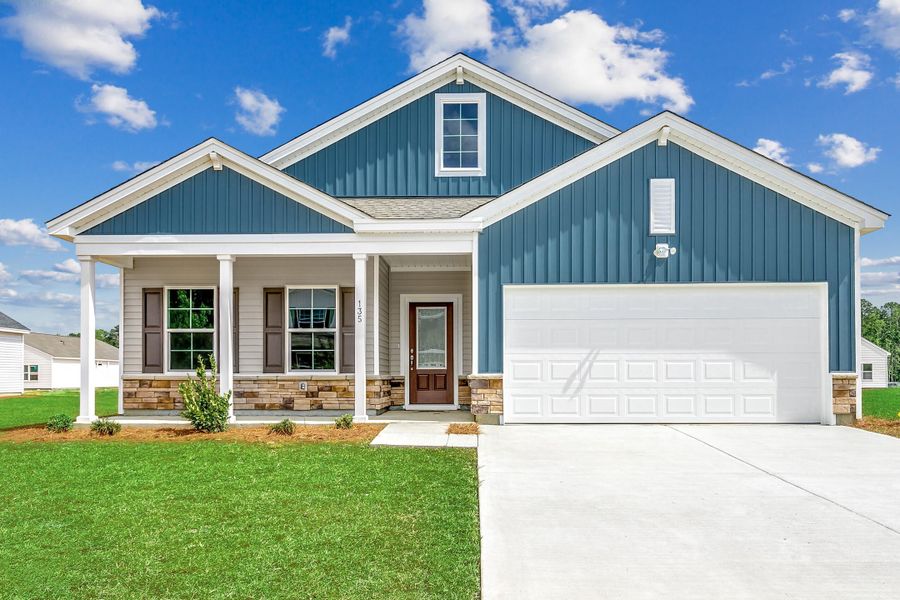 Front exterior of a new home in Fairway Woods at Wyboo, Manning, SC, highlighting curb appeal (Image 1).