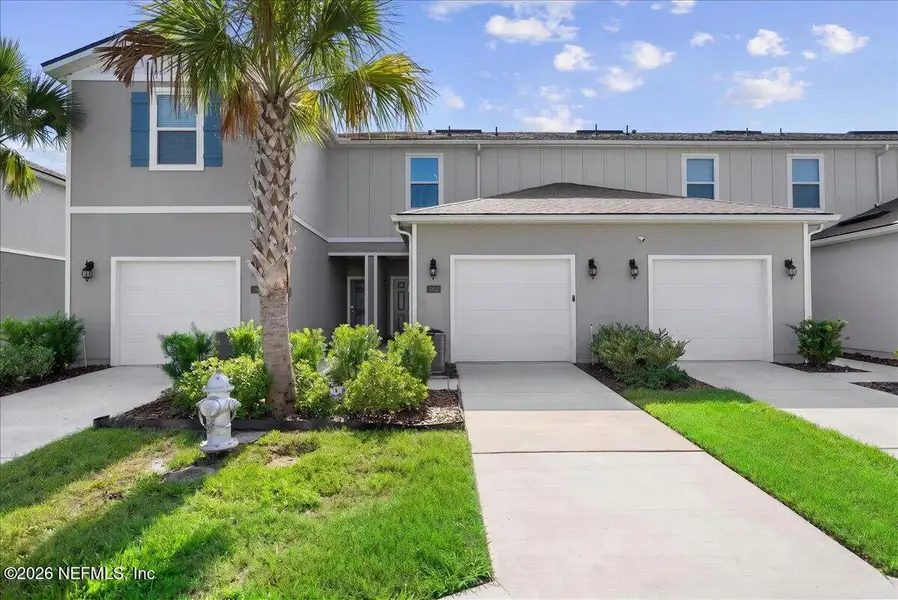 Front exterior of a new home in , Middleburg, FL, highlighting curb appeal (Image 25). Front exterior of a new home in , Middleburg, FL, highlighting curb appeal (Image 25).