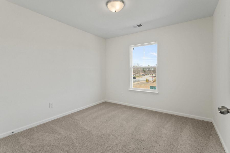 Spacious, unfurnished interior of a new home in Bellevue Townhomes, Greenville (Image 19). Spacious, unfurnished interior of a new home in Bellevue Townhomes, Greenville (Image 19).