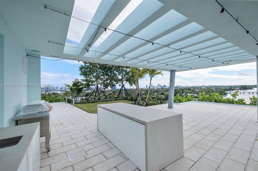 Exterior details and patio area of a home in , Bay Harbor Islands (Image 35).