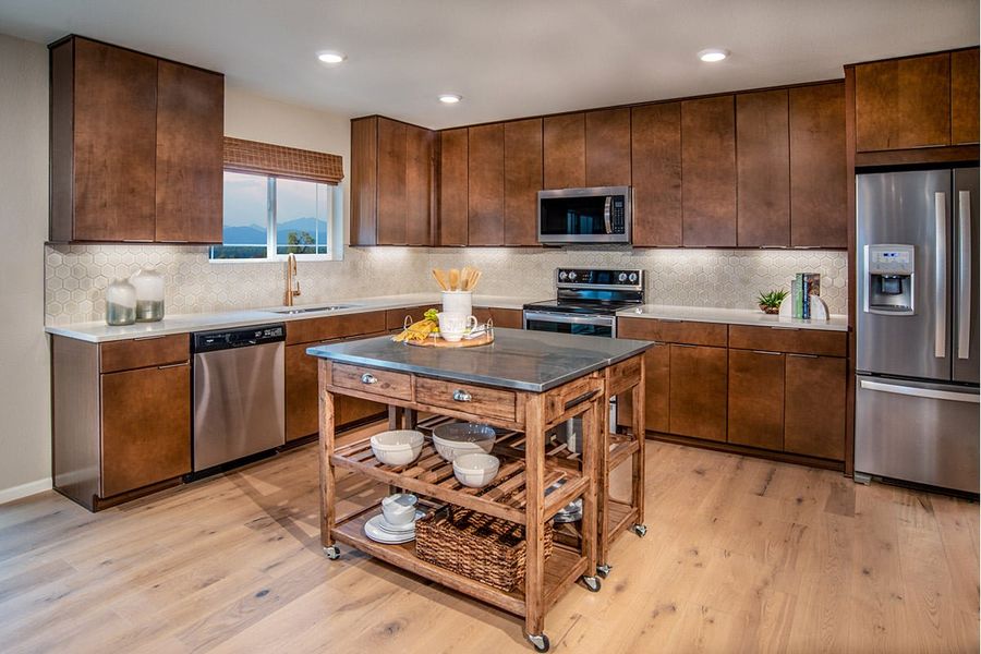 Representative furnished interior of a home built from the 2284 by KB Home in Painted Prairie, Aurora (Image 6).