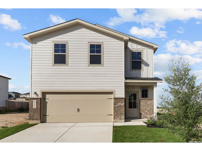 Front exterior of a new home in Agave, San Antonio, TX, highlighting curb appeal (Image 1). Front exterior of a new home in Agave, San Antonio, TX, highlighting curb appeal (Image 1).