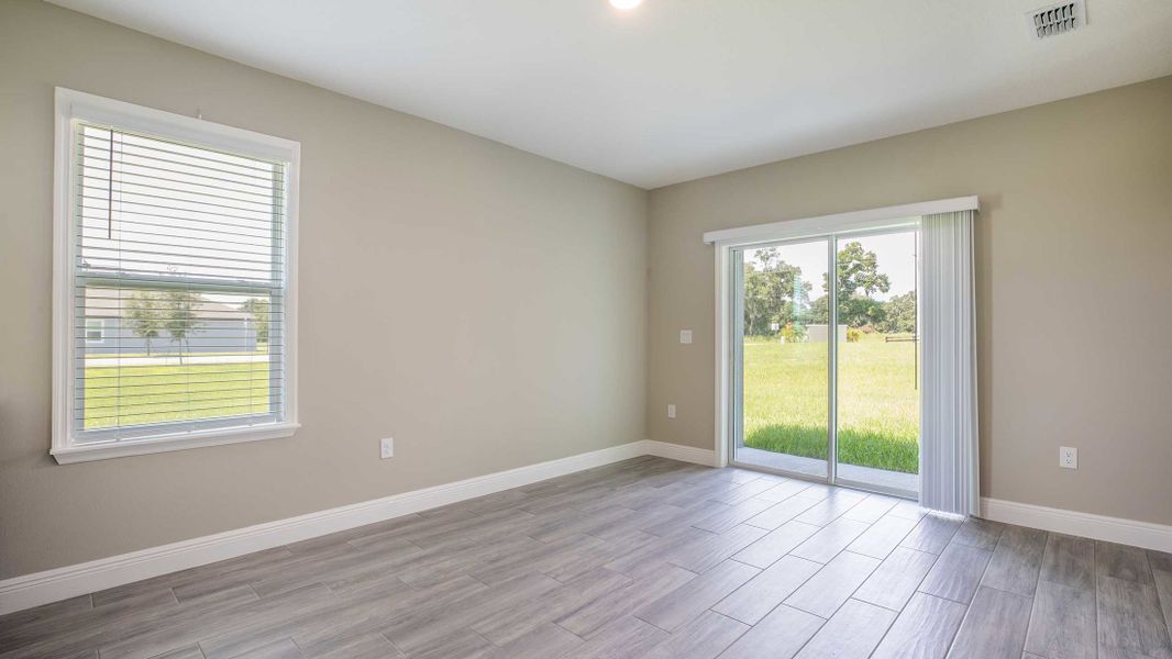 Representative unfurnished interior of a home built from the Columbus by Maronda Homes in Bella Estates, Plant City (Image 14).