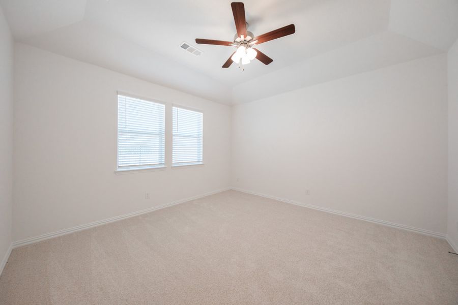 Spacious, unfurnished interior of a new home in The Villages of Hurricane Creek, Anna (Image 24).