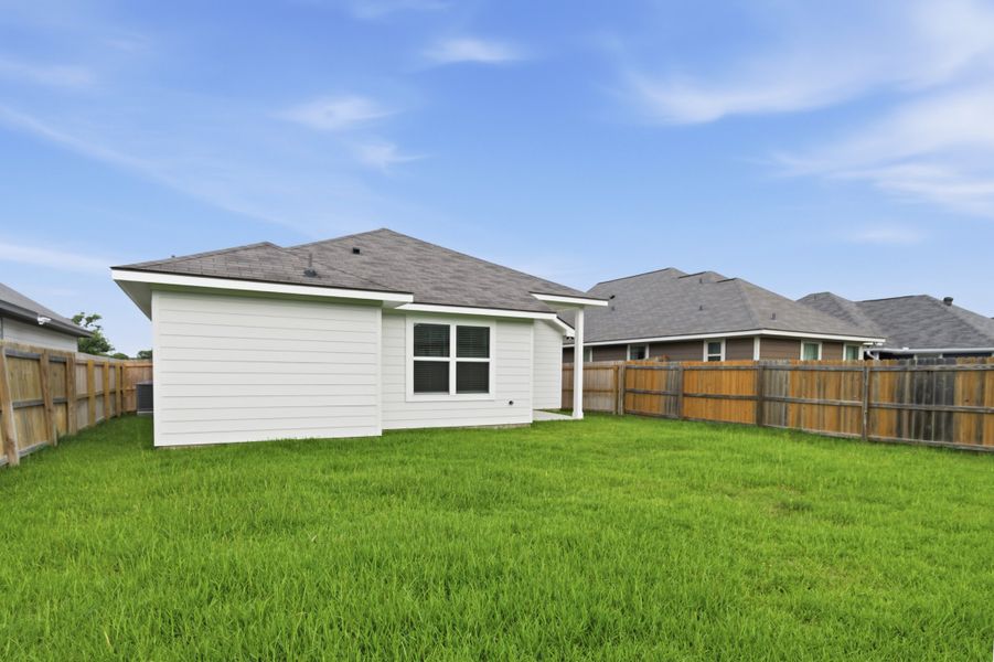Exterior details and patio area of a home in Bonham Trace, Bryan (Image 4).