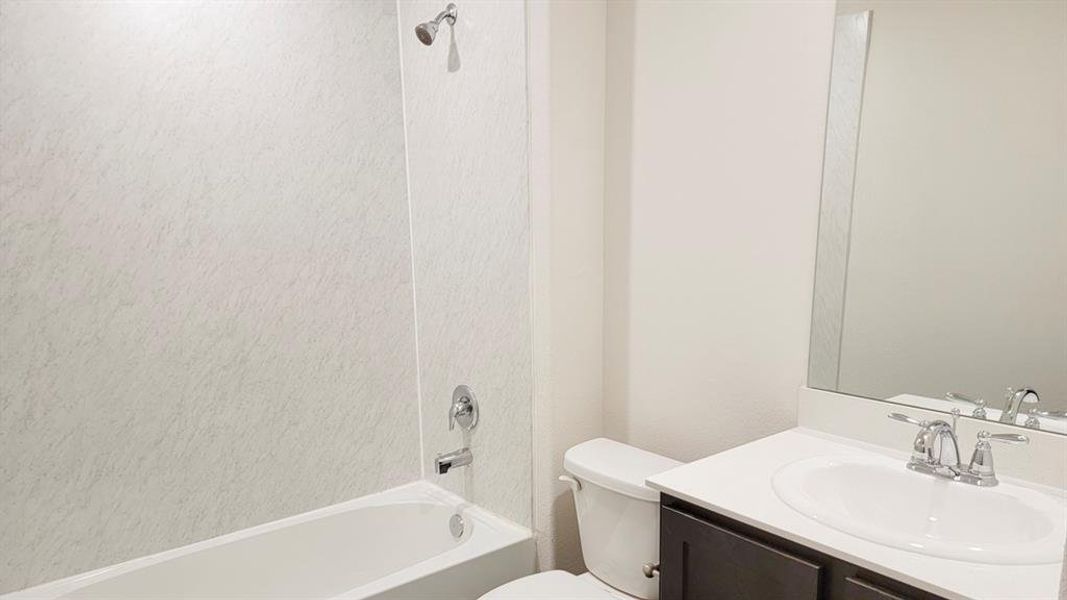 Full bath with washtub / shower combination and vanity Full bath with washtub / shower combination and vanity