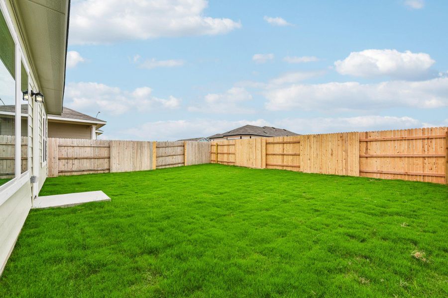 Exterior details and patio area of a home in Edgebrooke, Pflugerville (Image 3).