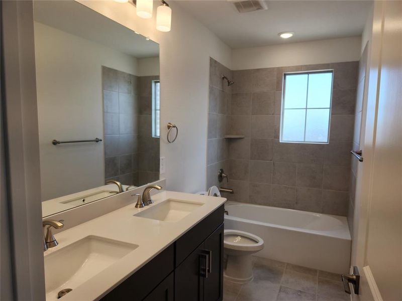 Furnished interior view inside a new home in Ashford Park - Texana Series, Corinth (Image 11).
