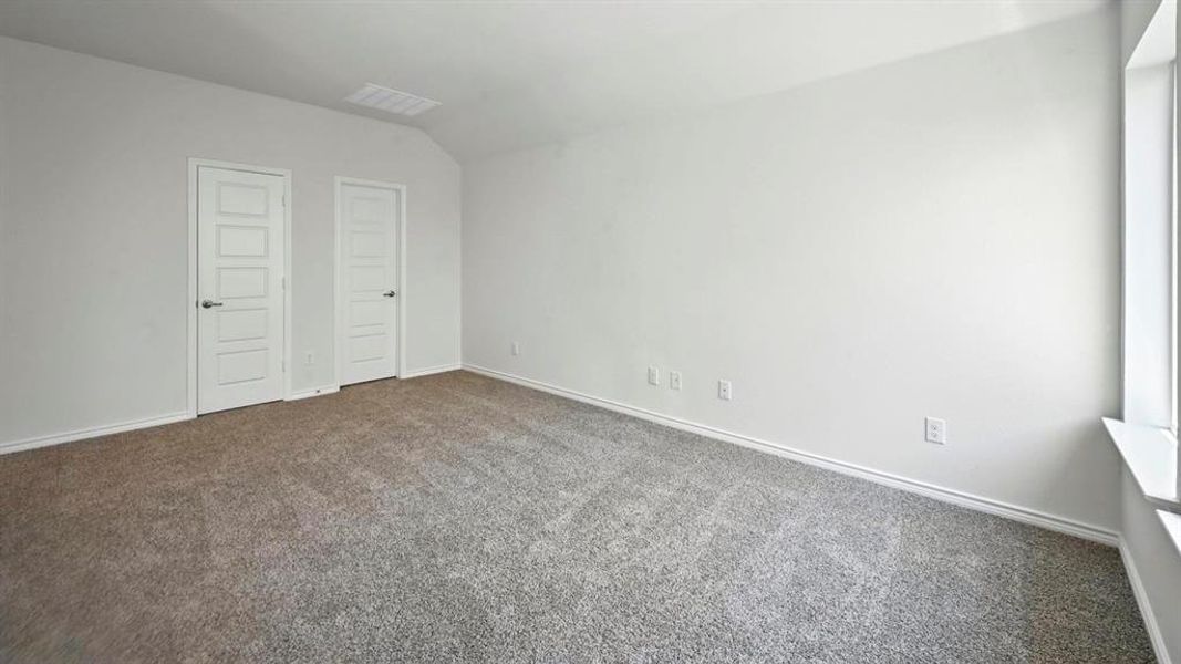 Unfurnished bedroom featuring carpet floors