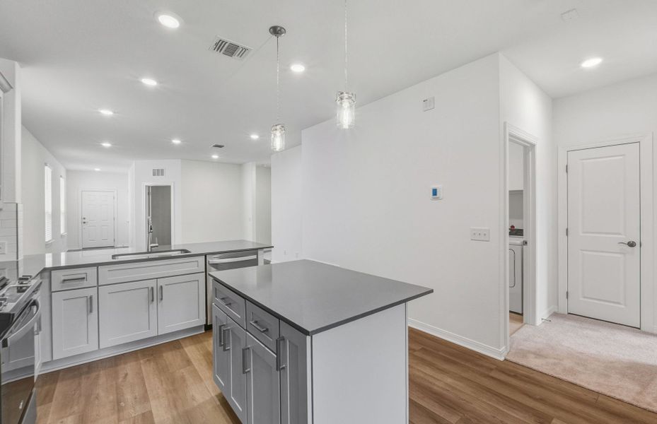 Furnished interior view inside a new home in Crosswinds, Kyle (Image 10).