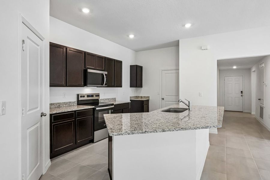 Furnished interior view inside a new home in Hilliard Ridge, Kissimmee (Image 7).