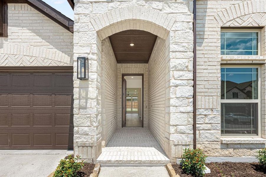 Front exterior of a new home in Willow Wood Classic 50, McKinney, TX, highlighting curb appeal (Image 25). Front exterior of a new home in Willow Wood Classic 50, McKinney, TX, highlighting curb appeal (Image 25).