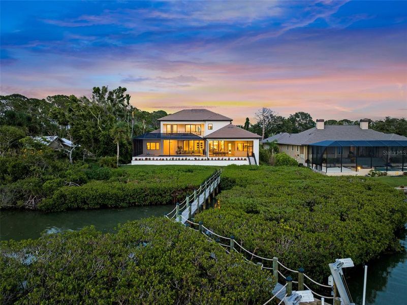 Front exterior of a new home in , Nokomis, FL, highlighting curb appeal (Image 24).