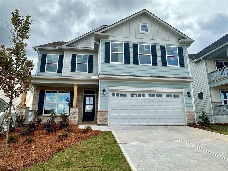 Exterior details and patio area of a home in Twin Lakes, Hoschton (Image 12).