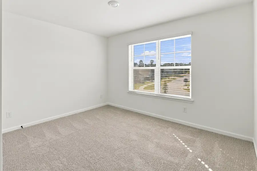 Spacious, unfurnished interior of a new home in The Groves of Berkeley, Moncks Corner (Image 32).