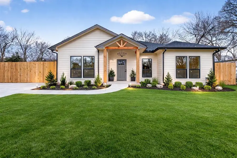 Front exterior of a new home in , Corsicana, TX, highlighting curb appeal (Image 1). Front exterior of a new home in , Corsicana, TX, highlighting curb appeal (Image 1).