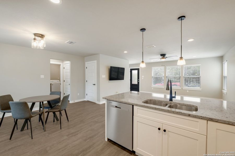 Furnished interior view inside a new home in , Lakehills (Image 7).
