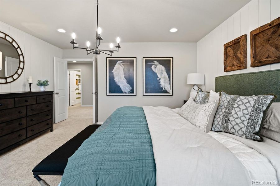 Photos shown are of a previously built model home and are intended to represent the floor plan. The home currently available may include different finishes, features, and selections.