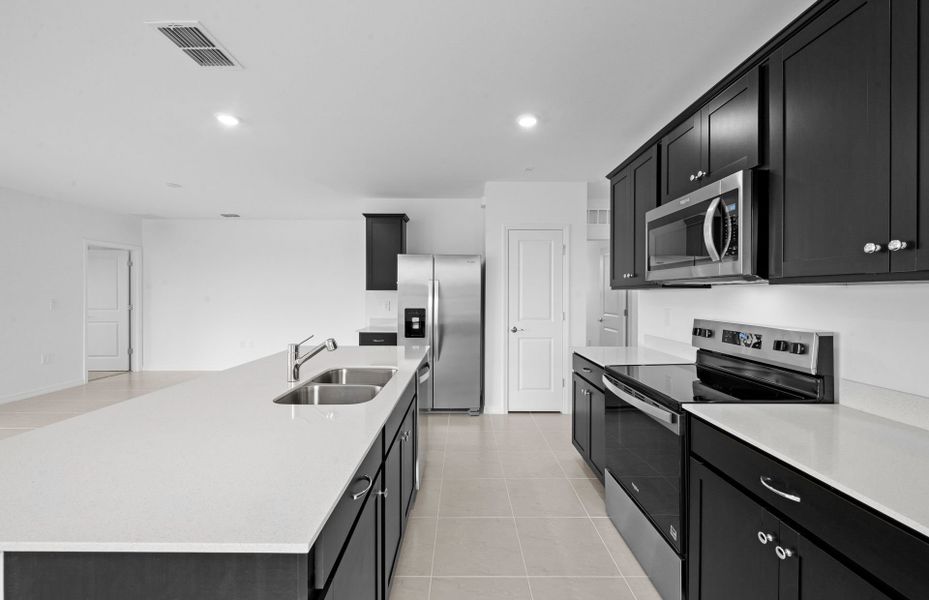 Furnished interior view inside a new home in Whispering Lakes, Lehigh Acres (Image 5). Furnished interior view inside a new home in Whispering Lakes, Lehigh Acres (Image 5).