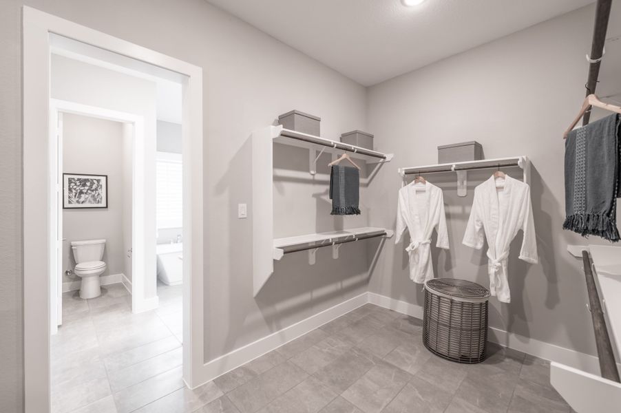 Representative furnished interior of a home built from the Barnhart by Tri Pointe Homes in Dunham Pointe, Cypress (Image 30).