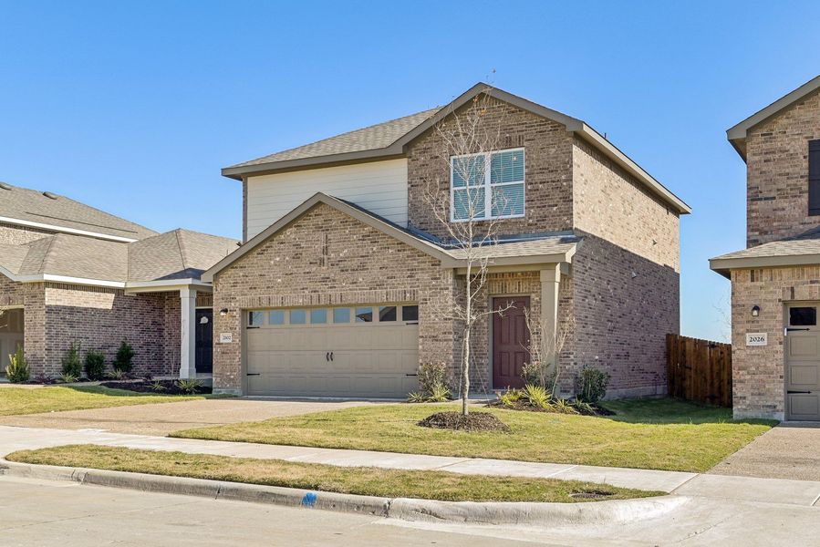 Representative exterior photo of a completed home built from the Endeavor by Starlight Homes in Monticello Park, Princeton, TX (Image 2). Representative exterior photo of a completed home built from the Endeavor by Starlight Homes in Monticello Park, Princeton, TX (Image 2).