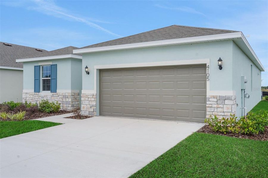 Front exterior of a new home in , Deland, FL, highlighting curb appeal (Image 16).