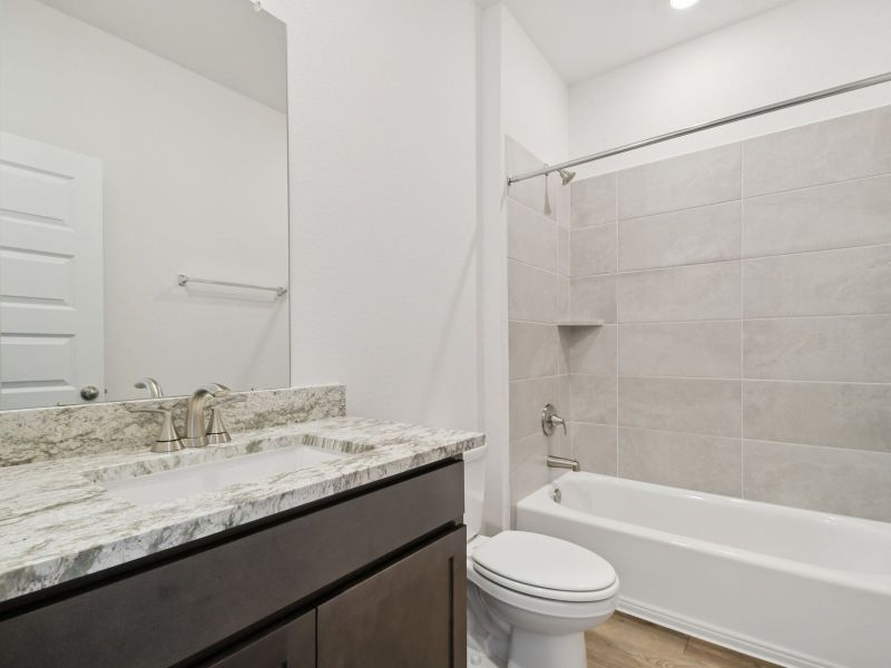 Furnished interior view inside a new home in Riverbend at Double Eagle - Boulevard Collection, Cedar Creek (Image 4).