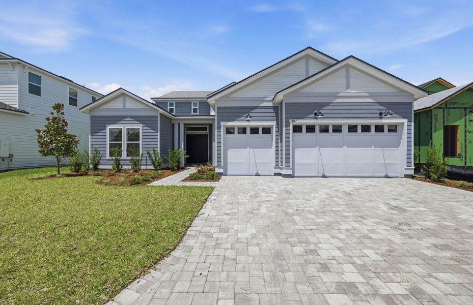 Representative exterior photo of a completed home built from the Regalia Grand by Pulte Homes in The Landings at Saint Johns, St. Johns, FL (Image 29). Representative exterior photo of a completed home built from the Regalia Grand by Pulte Homes in The Landings at Saint Johns, St. Johns, FL (Image 29).