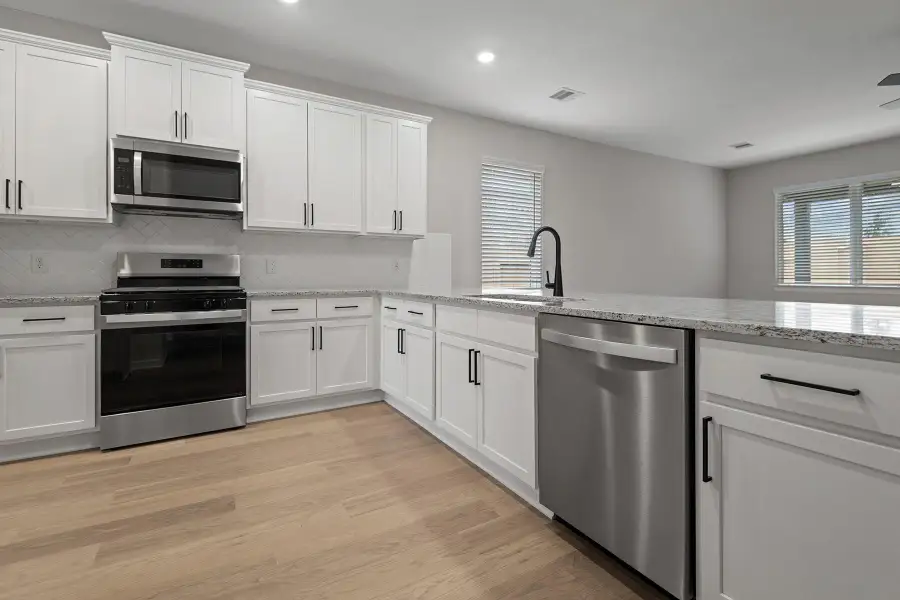 Furnished interior view inside a new home in Magnolia Woods, Magnolia (Image 3). Furnished interior view inside a new home in Magnolia Woods, Magnolia (Image 3).