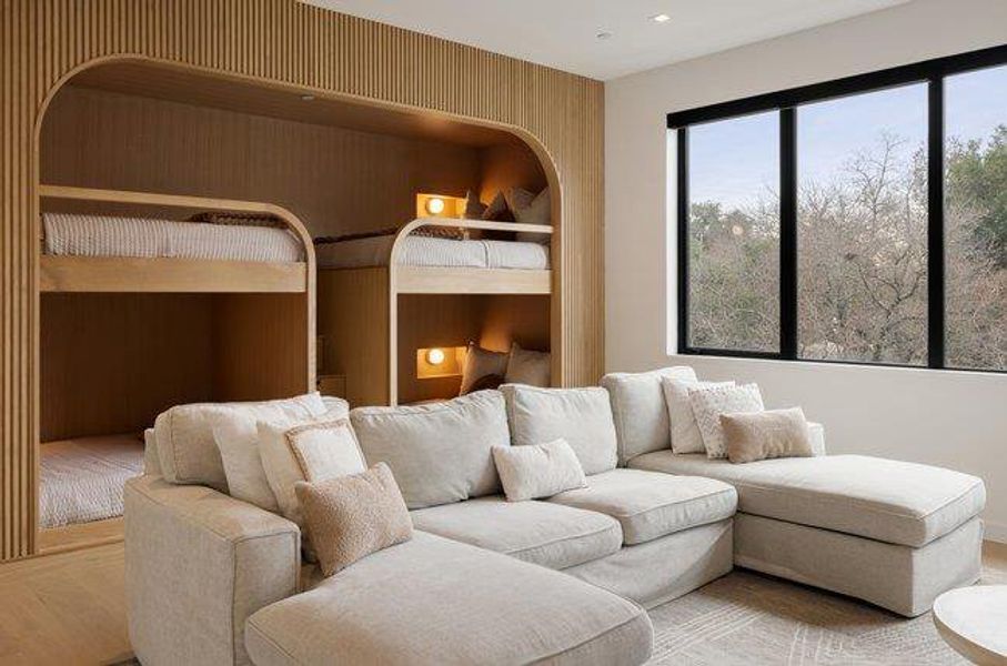 Built-in bunk beds with integrated lighting and natural wood paneling