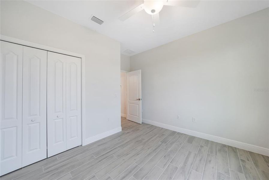 Spacious, unfurnished interior of a new home in , Port Charlotte (Image 35).
