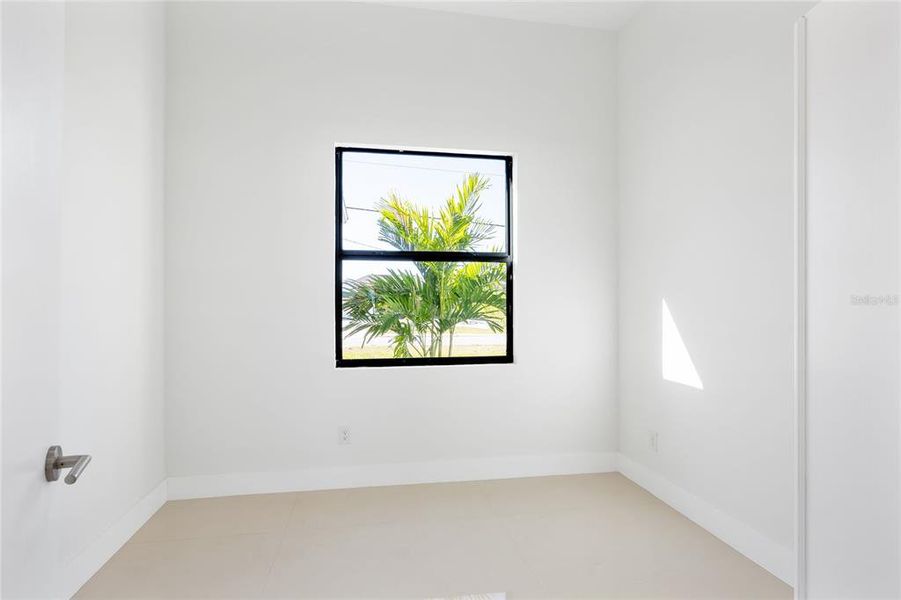 Spacious, unfurnished interior of a new home in , Port Charlotte (Image 25).