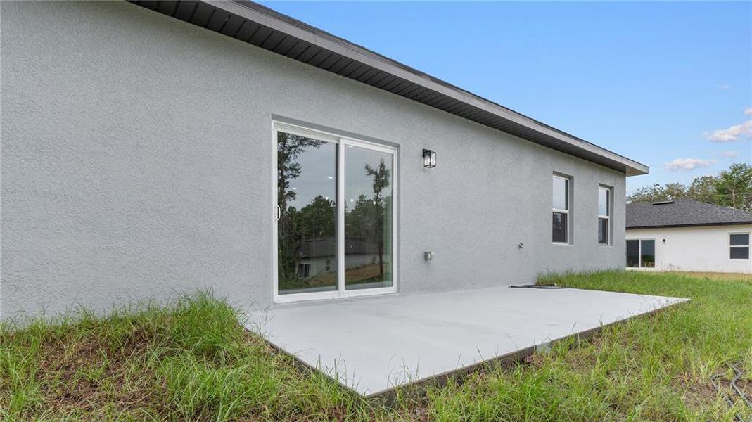 Front exterior of a new home in , Ocala, FL, highlighting curb appeal (Image 2).