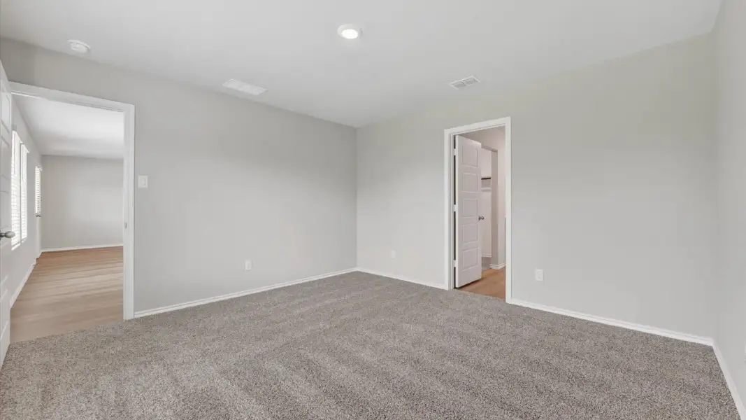 Spacious, unfurnished interior of a new home in Monarch at the Meadows, Ponder (Image 14).