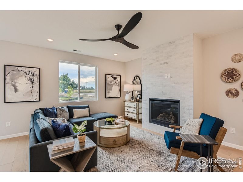 Living Room. Note: photos are of the same floorplan but different model, fireplace will not be included in the actual home.