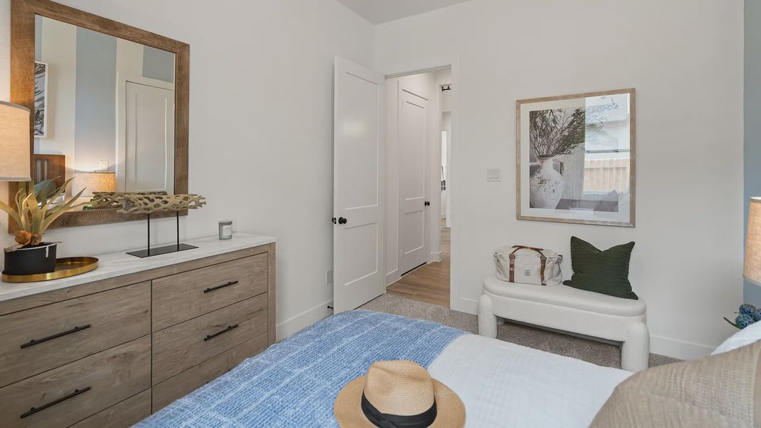 Representative furnished interior of a home built from the Hillcrest by Chesmar Homes in Artavia, Conroe (Image 21).