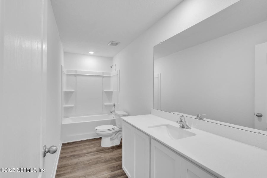 Furnished interior view inside a new home in Rolling Hills, Green Cove Springs (Image 12). Furnished interior view inside a new home in Rolling Hills, Green Cove Springs (Image 12).