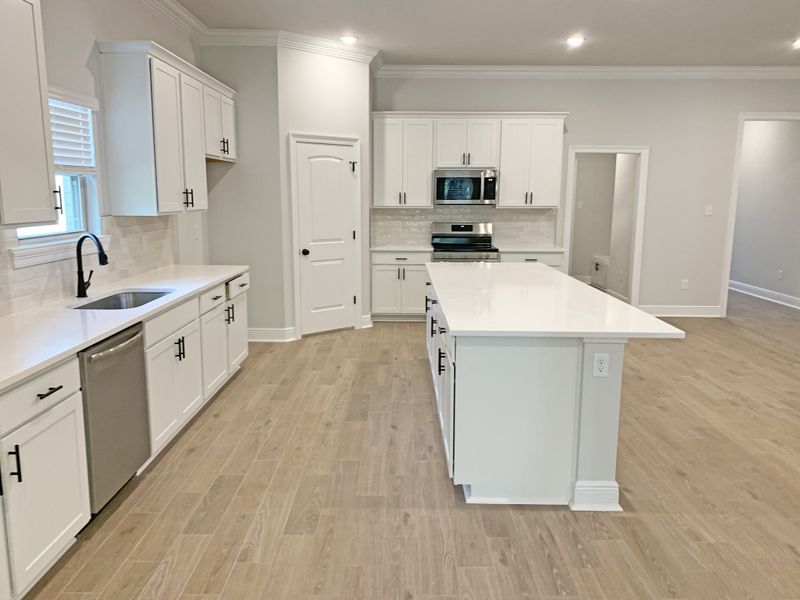 Furnished interior view inside a new home in Sentinel Ridge, Pace (Image 5).