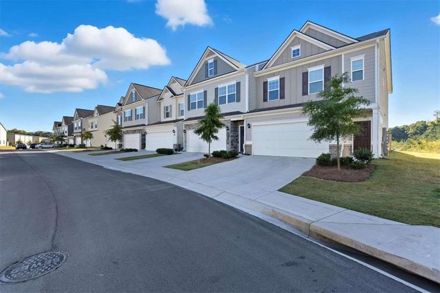 Front exterior of a new home in , Jasper, GA, highlighting curb appeal (Image 23).