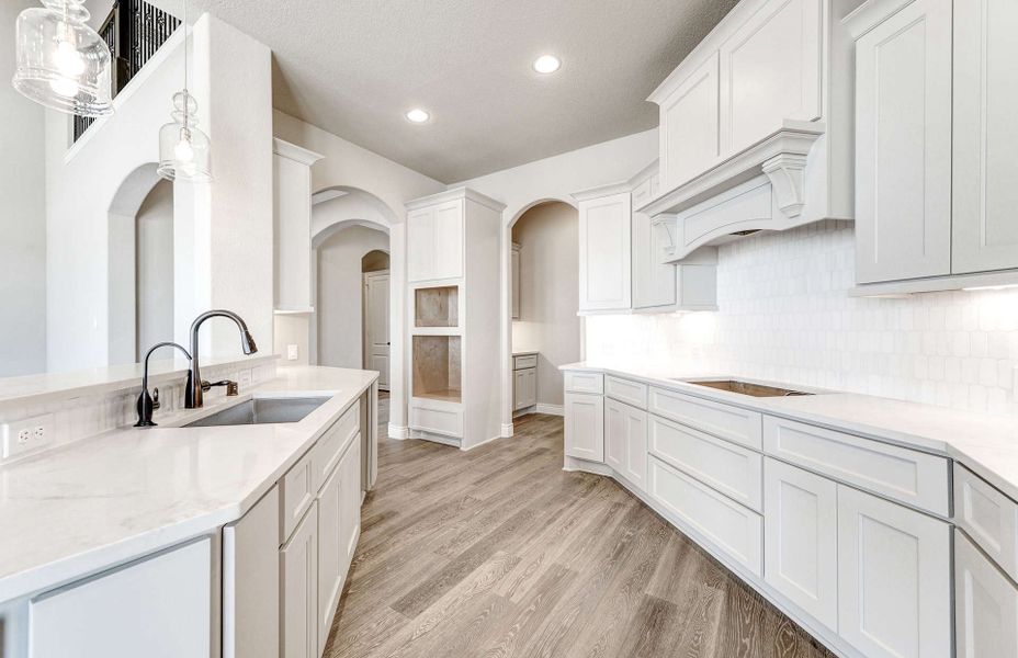 Furnished interior view inside a new home in Bridgeland 60′, Cypress (Image 7).