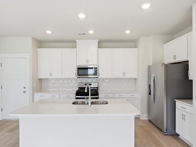 Furnished interior view inside a new home in Crossing at Abner Creek, Greer (Image 3).