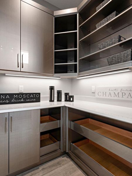 Furnished interior view inside a new home in PGA Village Verano, Port St. Lucie (Image 15).