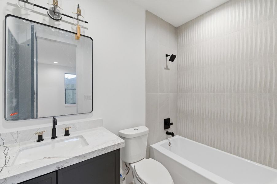 Stylish finishes and contemporary design make these secondary bathrooms both elegant and practical for family and guests alike.