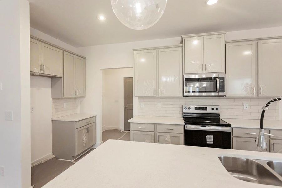 Furnished interior view inside a new home in , Buford (Image 7).