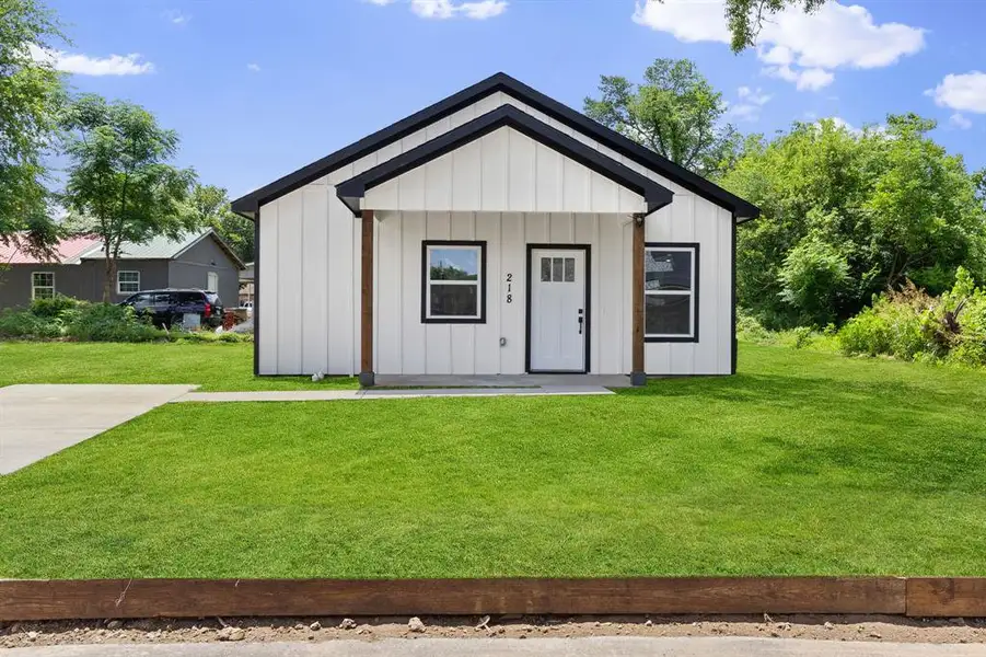 Front exterior of a new home in , Sulphur Springs, TX, highlighting curb appeal (Image 1). Front exterior of a new home in , Sulphur Springs, TX, highlighting curb appeal (Image 1).