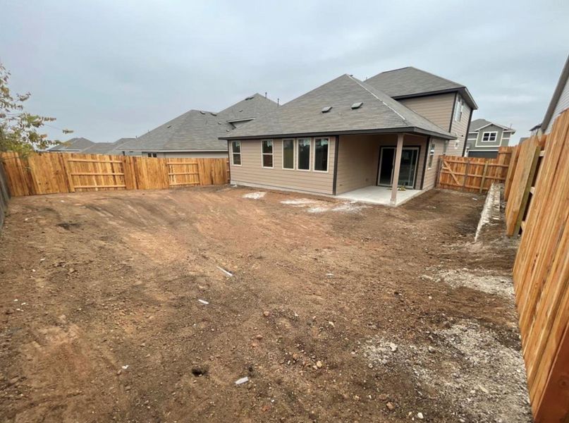 Exterior details and patio area of a home in Covered Bridge, Hutto (Image 4).