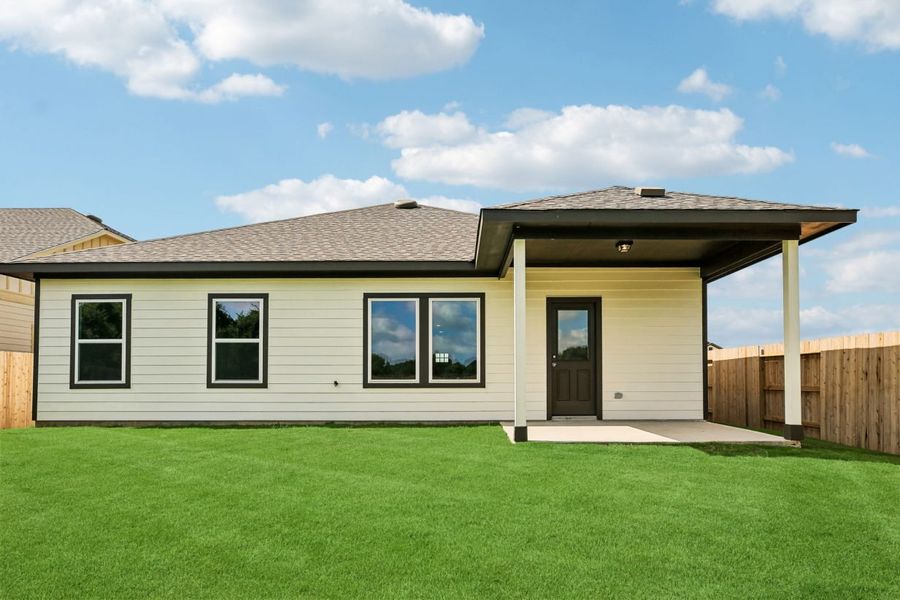 Exterior details and patio area of a home in Mustang Meadows, Waller (Image 3).