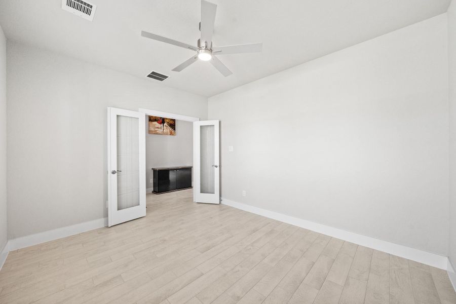 Spacious, unfurnished interior of a new home in Morton Creek Ranch, Katy (Image 42).