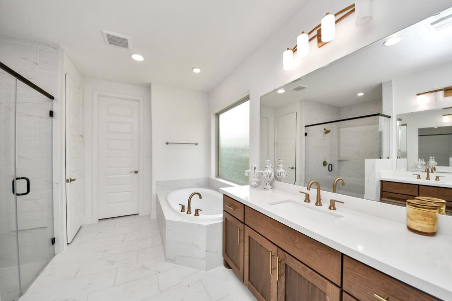 Relaxing bathroom retreat connected to the primary suite.