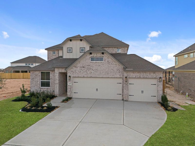Front exterior of a new home in Sunterra Lakes, Fulshear, TX, highlighting curb appeal (Image 21).